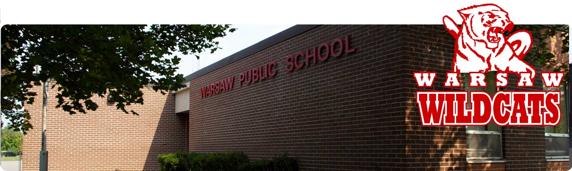 This is a picture of the front of our school with the name in red letters.
